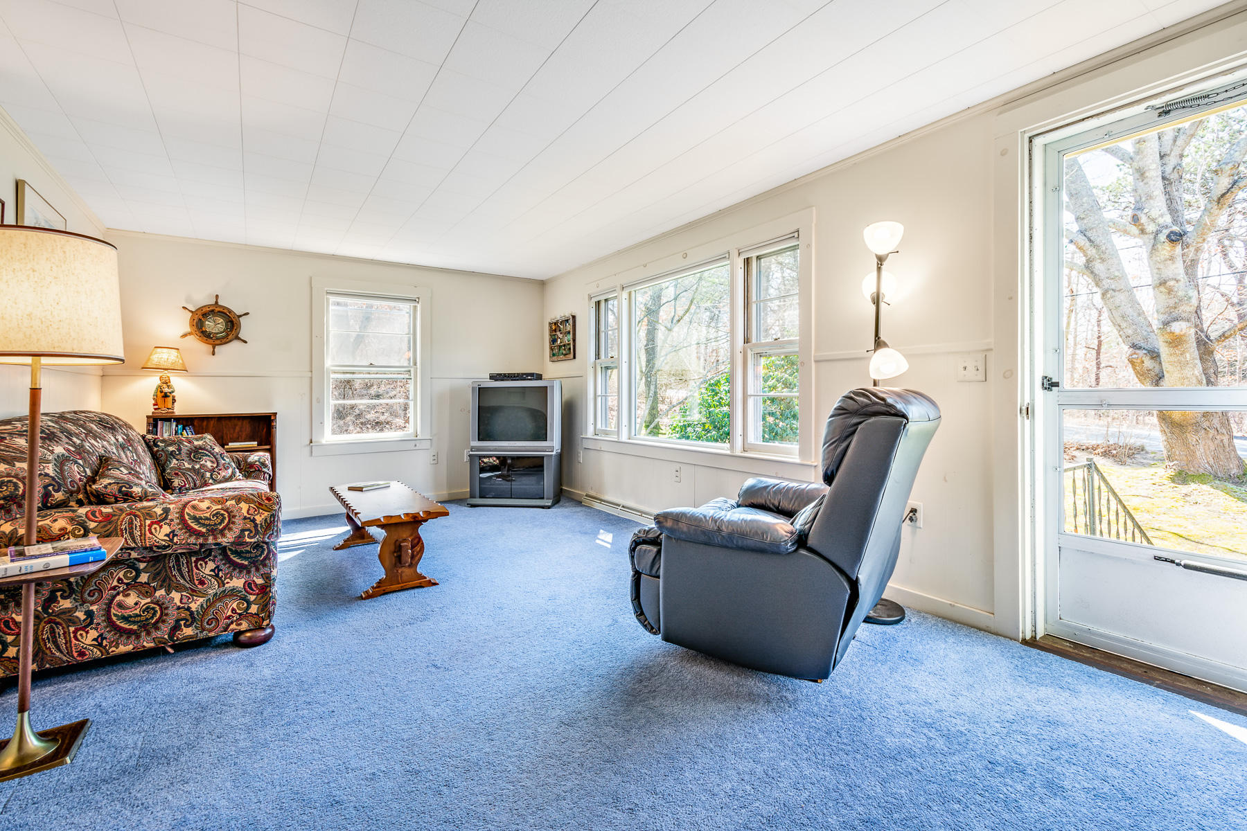 13 Atwood Road Truro, MA 02666 - Photo 21 of 36 a living room with furniture and a large window