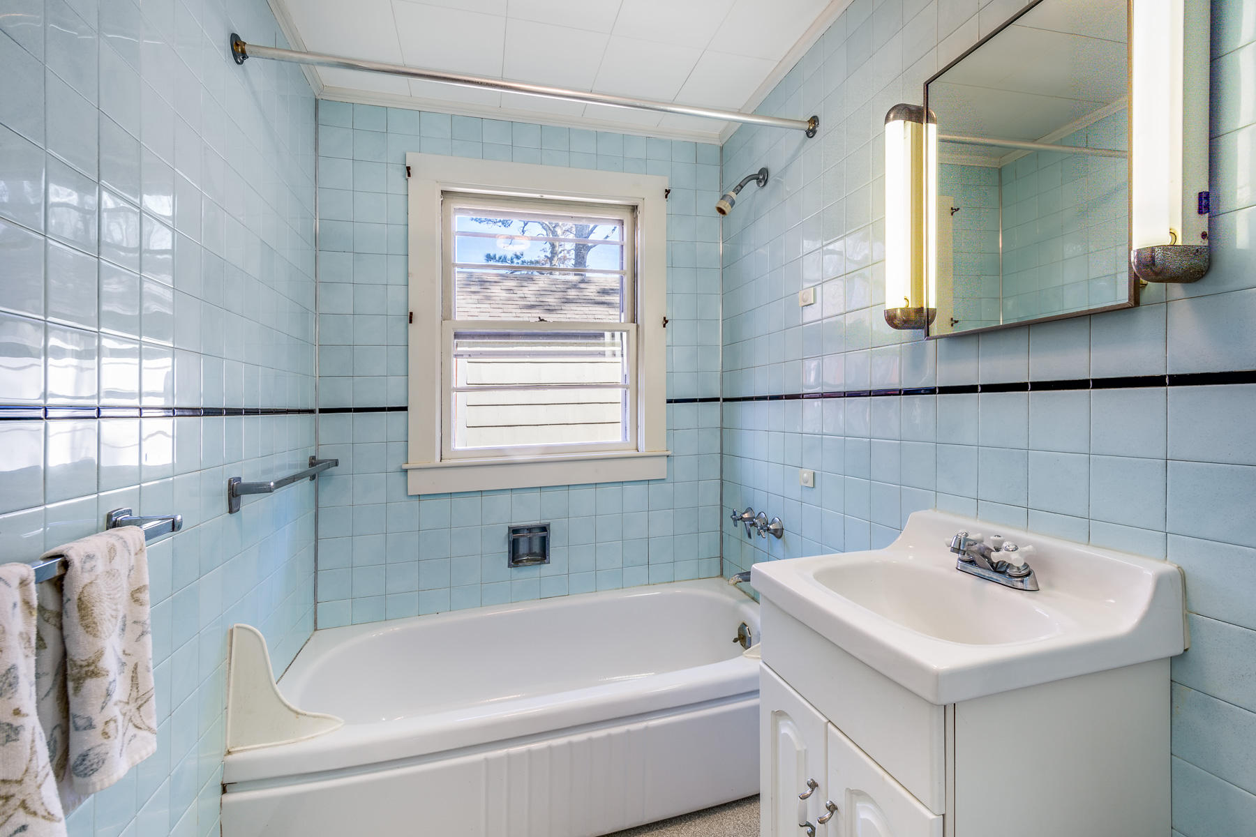 13 Atwood Road Truro, MA 02666 - Photo 27 of 36 a bathroom with a sink and a bathtub