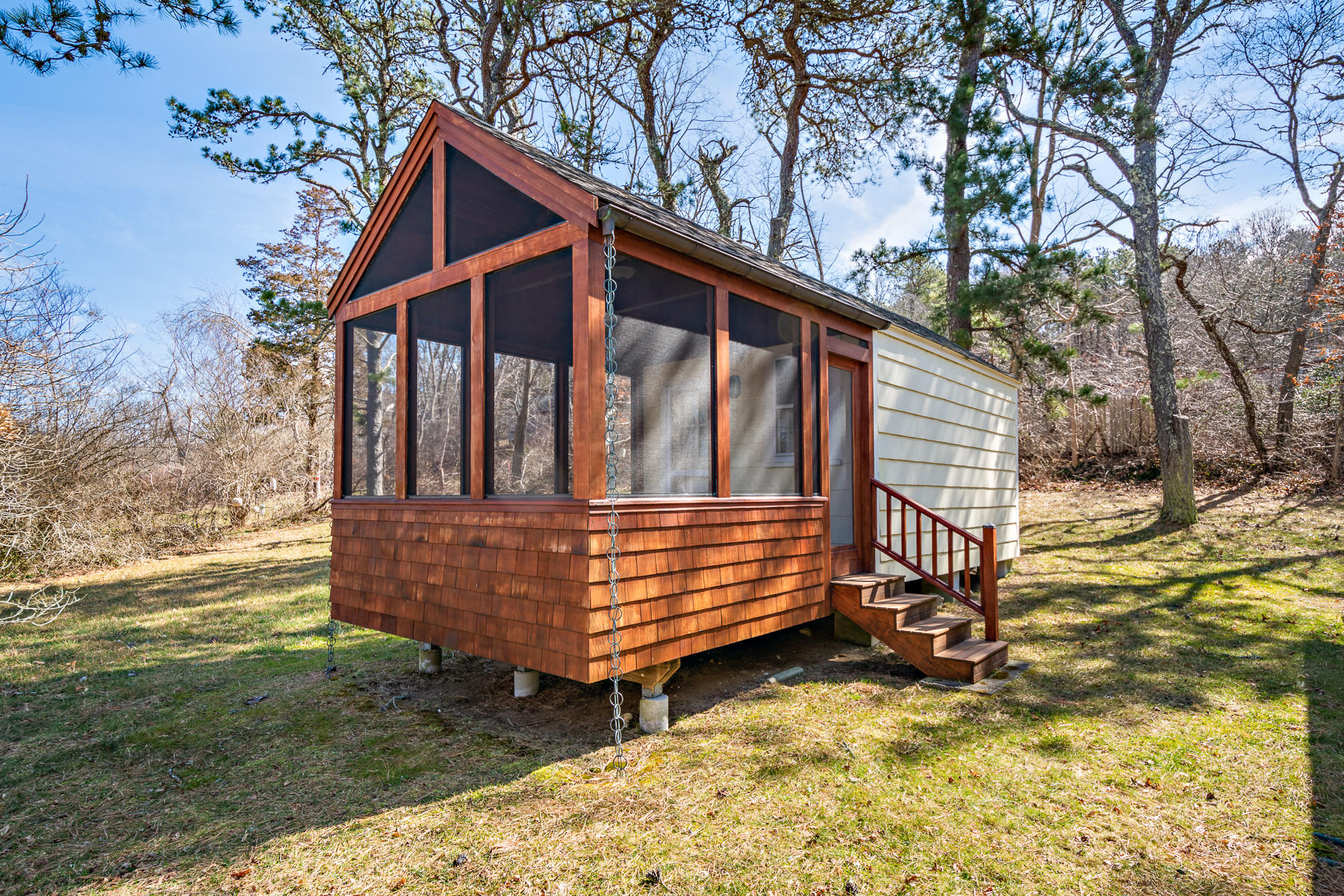 13 Atwood Road Truro, MA 02666 - Photo 5 of 36 a view of wooden house with a yard