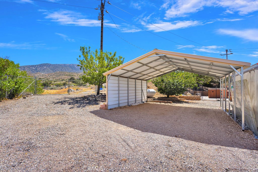 9072 Green Road Pinon Hills, CA 92372 - Photo 60 of 70 metal carport, large enough for 2 cars