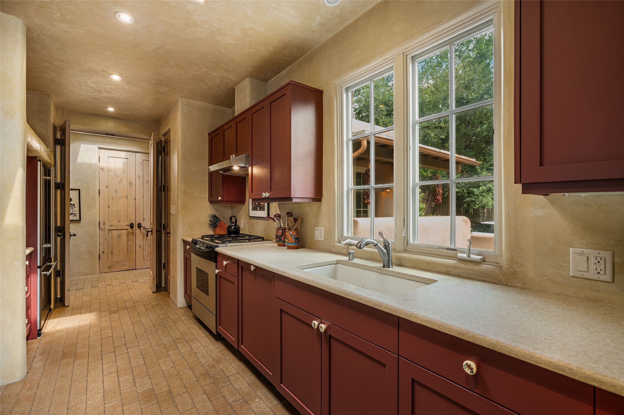 1 Cerro Gordo Road, Unit B Santa Fe, NM 87501 - Photo 12 of 25 Classic kitchen window in the bright and airy open kitchen.