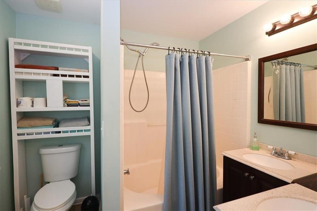 236 Hiram Sudie Road Dallas, GA 30157 - Photo 14 of 26 a bathroom with a granite countertop sink toilet and shower