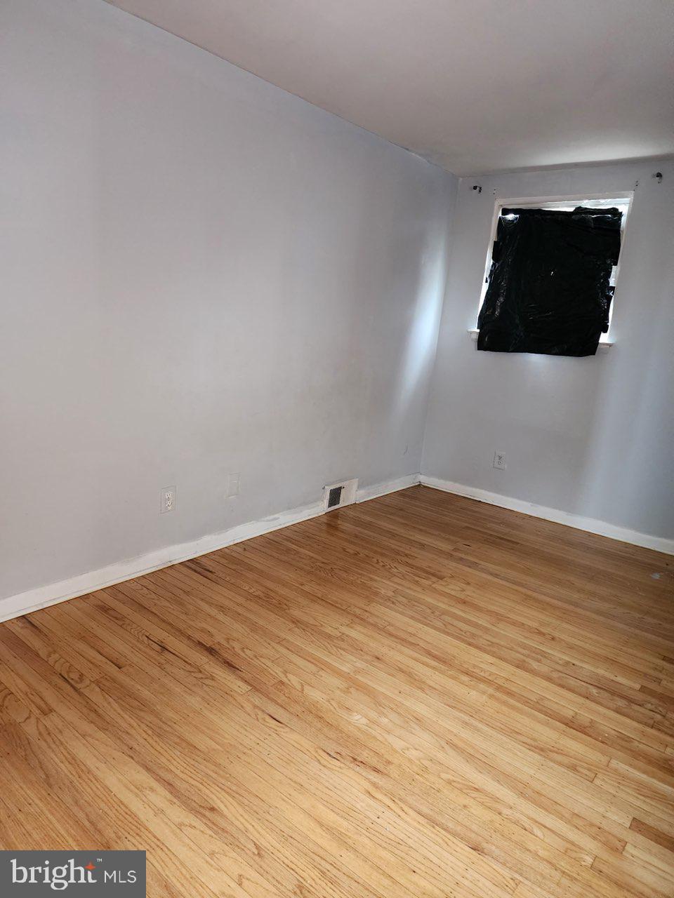 3324 Primrose Road Philadelphia, PA 19114 - Photo 4 of 6 a view of empty room with wooden floor