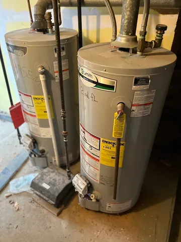 a utility room with washer and dryer