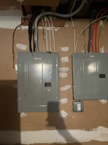 a view of a living room with wooden floor