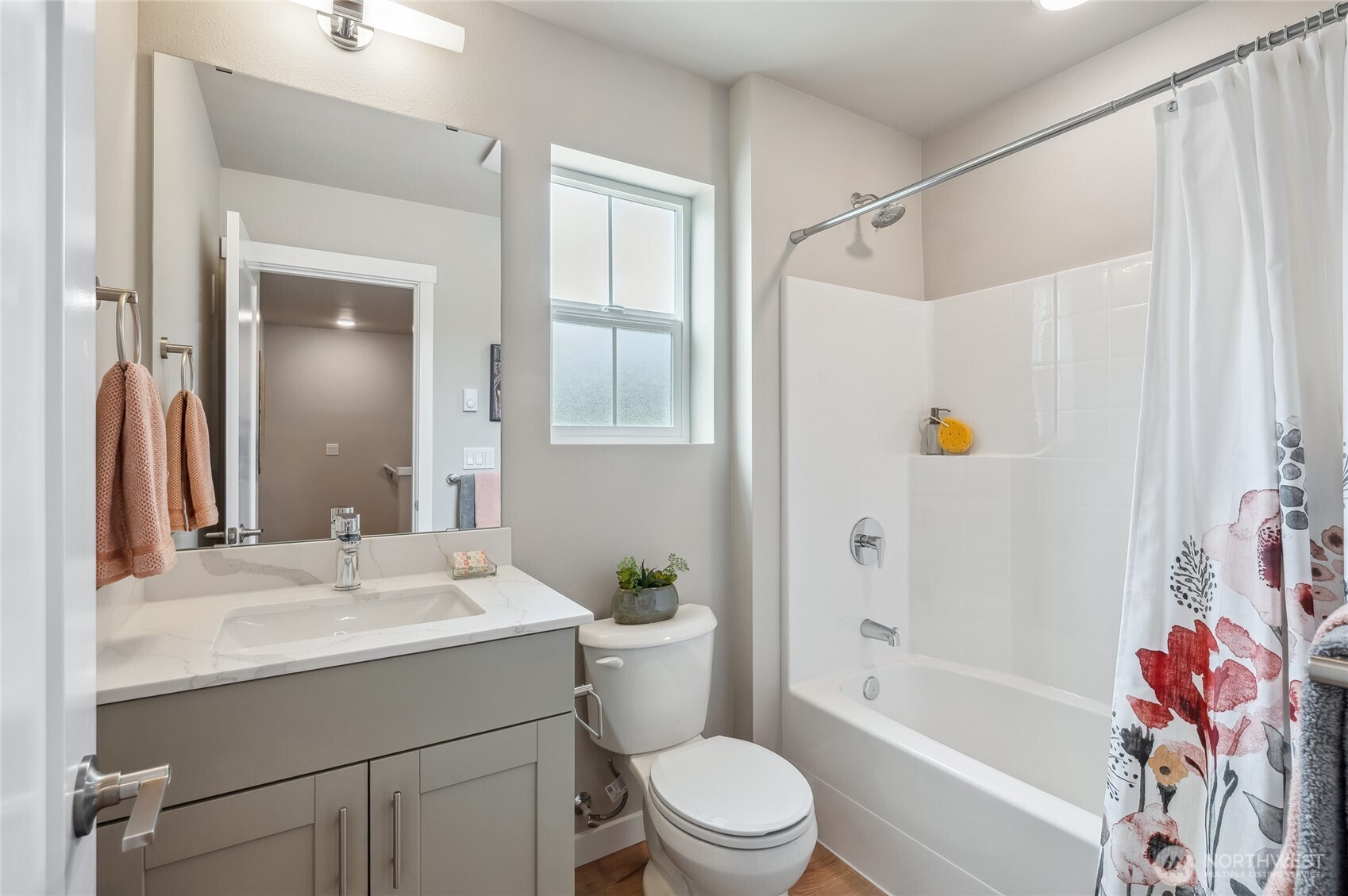 1322 194th Street Southeast, Unit B7 Bothell, WA 98012 - Photo 15 of 18 a bathroom with a sink toilet and shower
