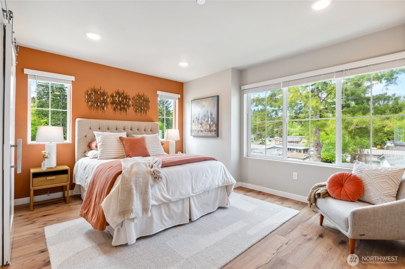 1322 194th Street Southeast, Unit B7 Bothell, WA 98012 - Photo 10 of 18 a bedroom with a bed and a couch