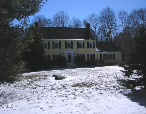 12 Old Redding Road Weston, CT 06883 - Photo 1 of 1 a front view of a house with a yard