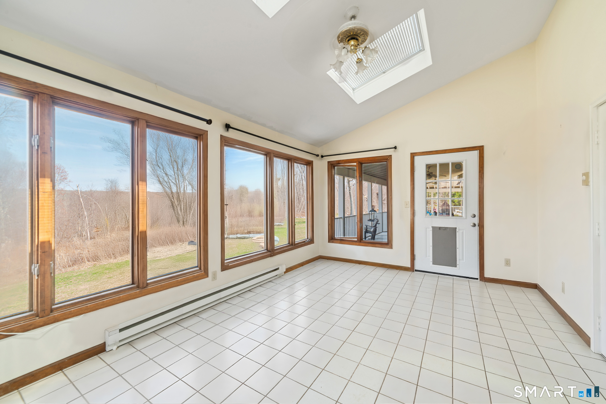 110 Sleepy Hill Road Southbury, CT 06488 - Photo 34 of 40 Lovely Sunroom off of the kitchen leading into the back porch