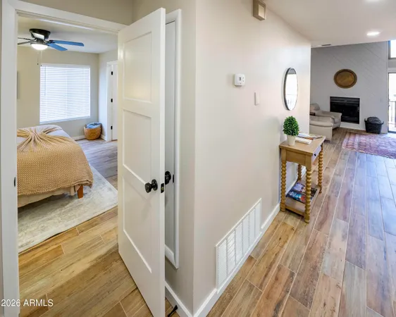 a living room with furniture rug and window