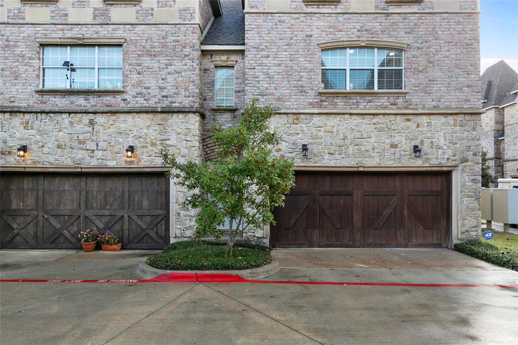 2700 Club Ridge Drive, Unit 7 Lewisville, TX 75067 - Photo 1 of 1 a front view of a house with garage
