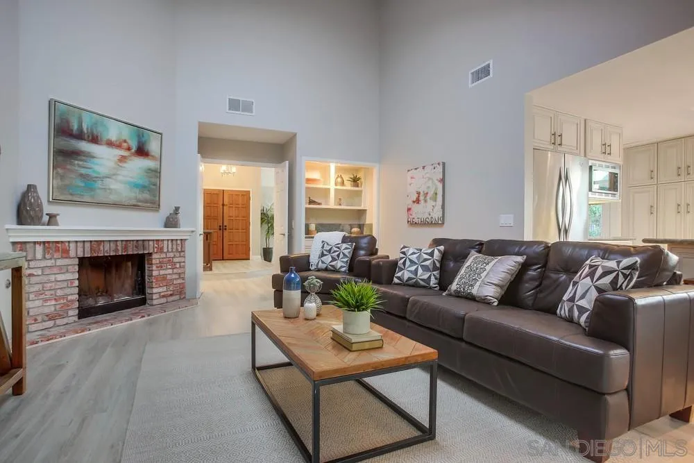 3534 Avenida Sierra Escondido, CA 92029 - Photo 12 of 38 a living room with furniture and a fireplace