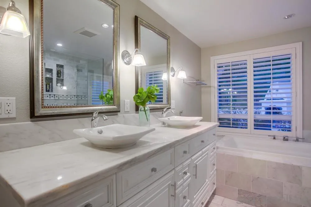 3534 Avenida Sierra Escondido, CA 92029 - Photo 18 of 38 a bathroom with a granite countertop sink mirror and bathtub