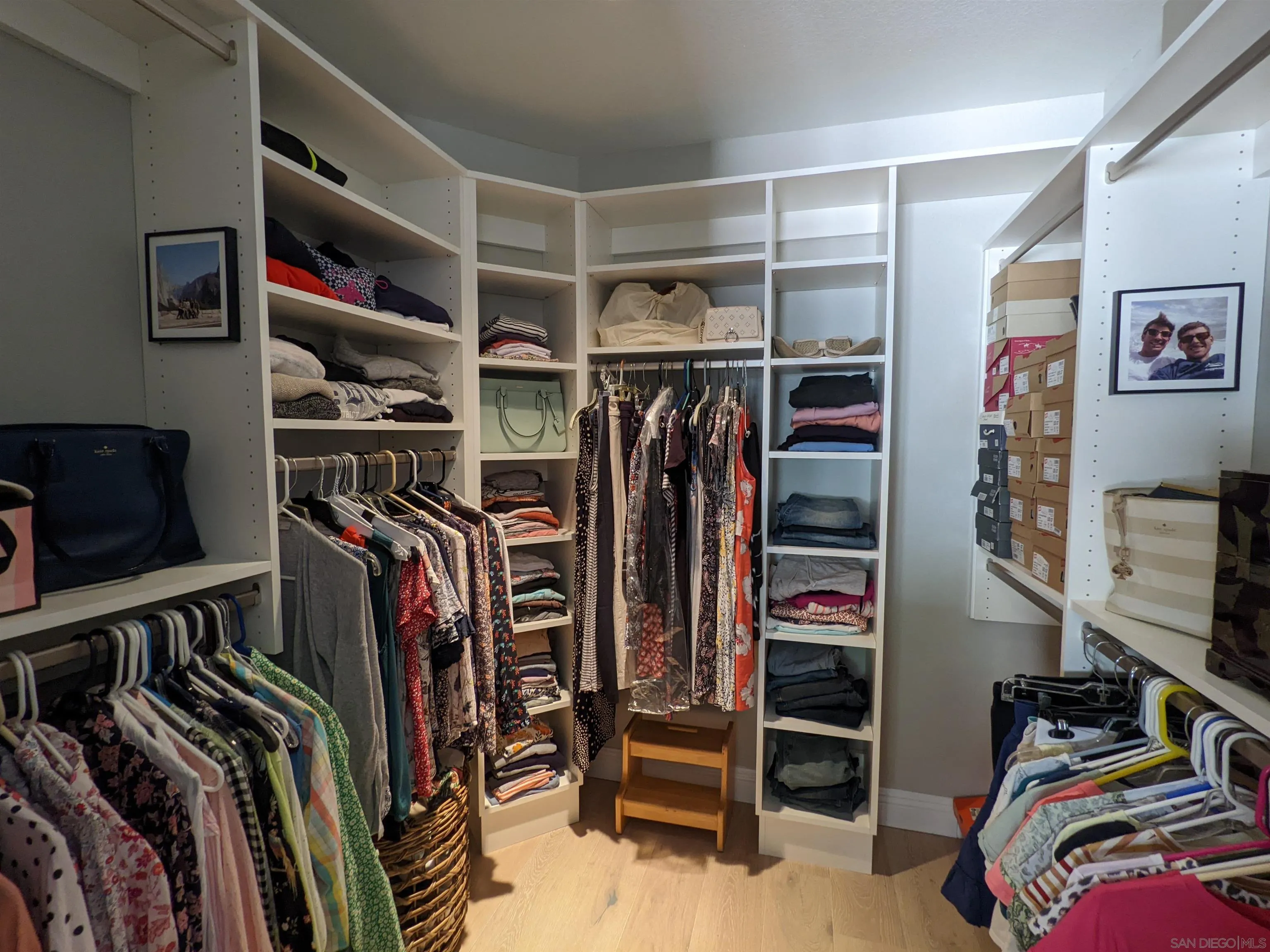 3534 Avenida Sierra Escondido, CA 92029 - Photo 21 of 38 a view of walk in closet with clothes and shoes