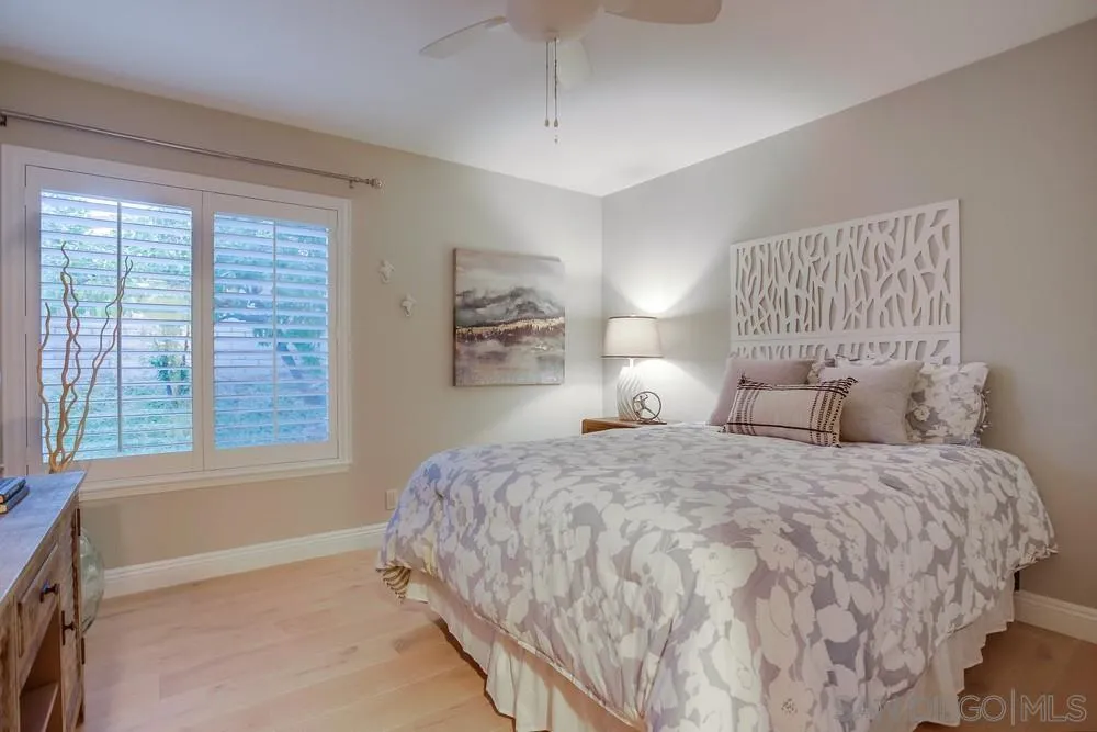 3534 Avenida Sierra Escondido, CA 92029 - Photo 23 of 38 a bedroom with a bed and a window