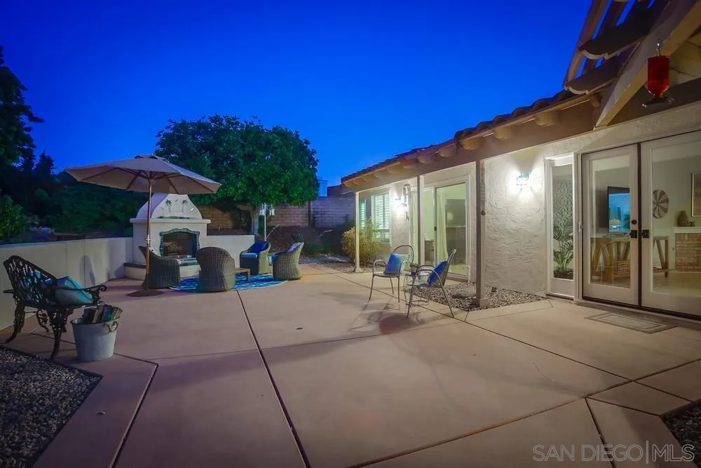 3534 Avenida Sierra Escondido, CA 92029 - Photo 27 of 38 a view of a patio with table and chairs and potted plants
