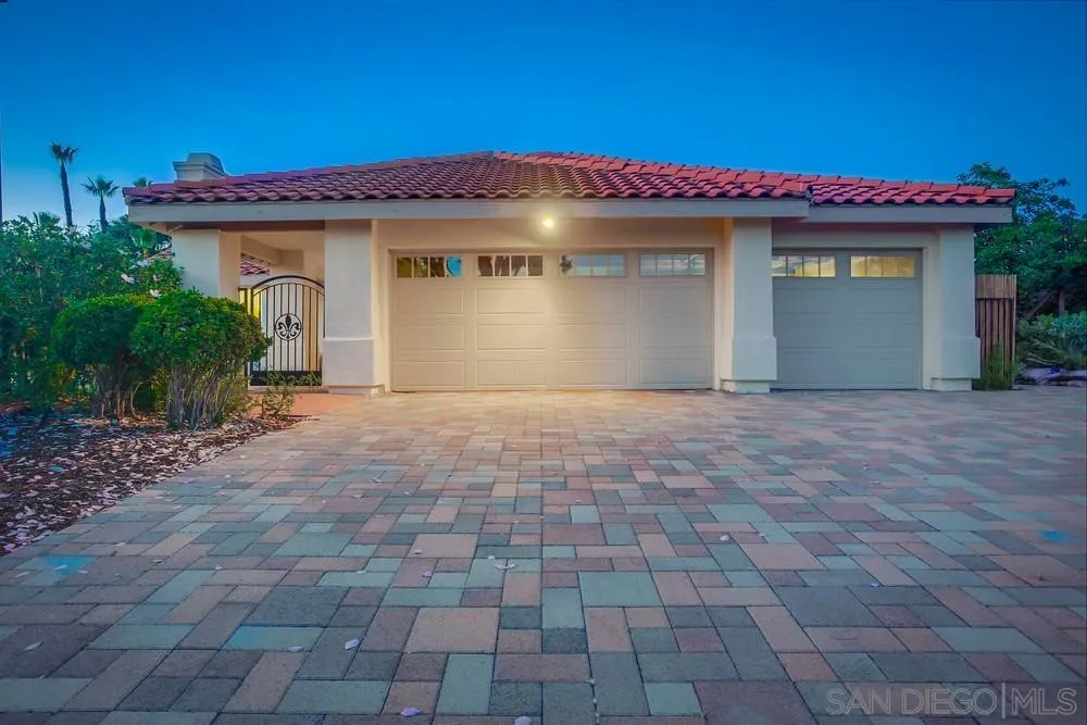 3534 Avenida Sierra Escondido, CA 92029 - Photo 4 of 38 a front view of a house with a garden