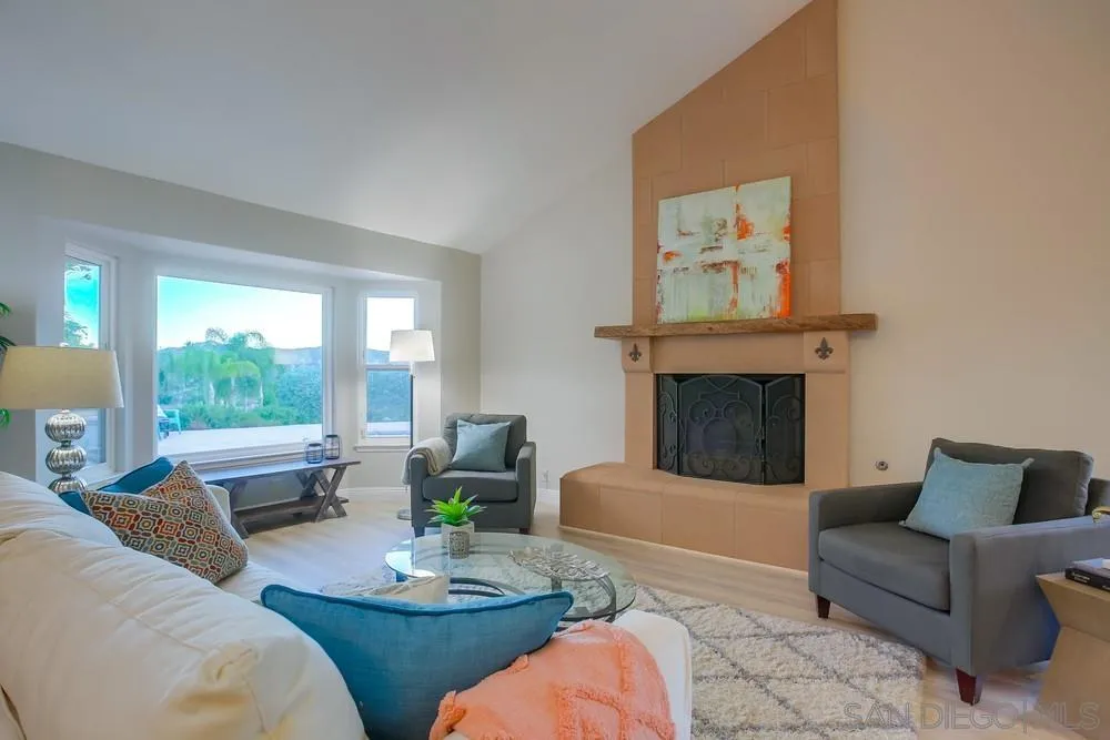 3534 Avenida Sierra Escondido, CA 92029 - Photo 7 of 38 a living room with furniture and a fireplace