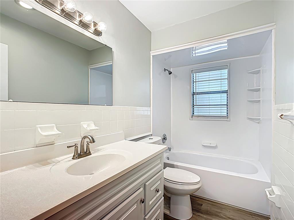 1406 Eden Drive Inverness, FL 34450 - Photo 26 of 41 a bathroom with a sink a toilet and a bathtub