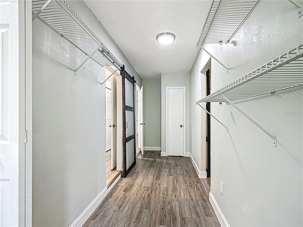 1406 Eden Drive Inverness, FL 34450 - Photo 29 of 41 a view of hallway with wooden floor