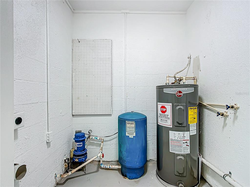 1406 Eden Drive Inverness, FL 34450 - Photo 30 of 41 a view of storage and utility room with a window