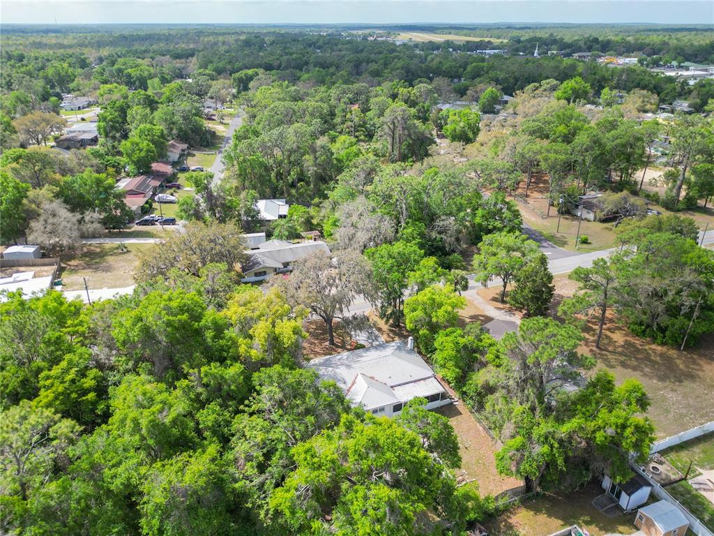 1406 Eden Drive Inverness, FL 34450 - Photo 38 of 41 an aerial view of a houses with a yard