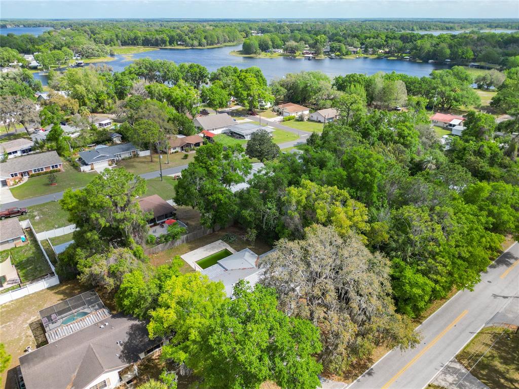 1406 Eden Drive Inverness, FL 34450 - Photo 41 of 41 a view of a garden with a lake view