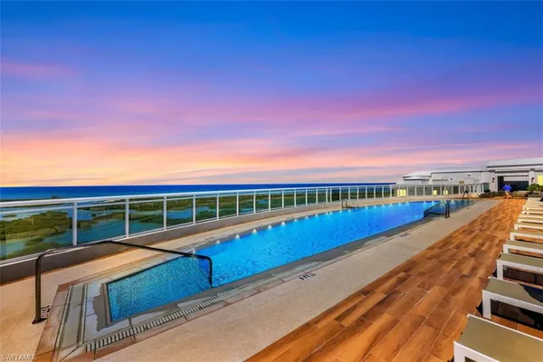 a view of a balcony with a ocean view