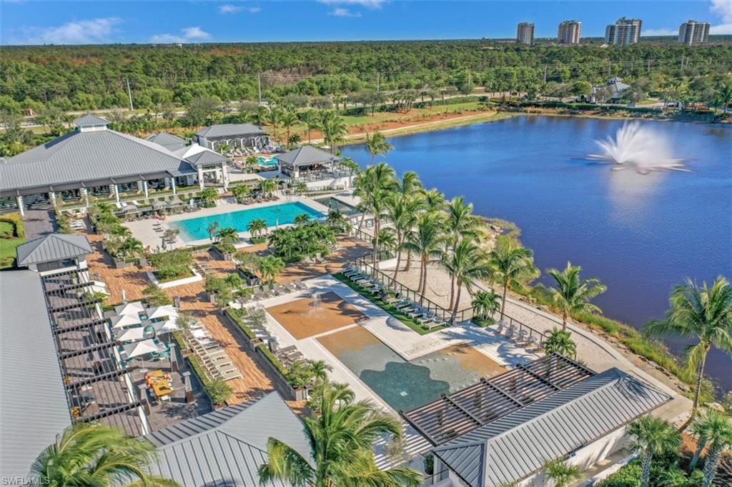 13915 Old Coast Road, Unit 305 Naples, FL 34110 - Photo 35 of 41 an aerial view of residential houses with outdoor space and river