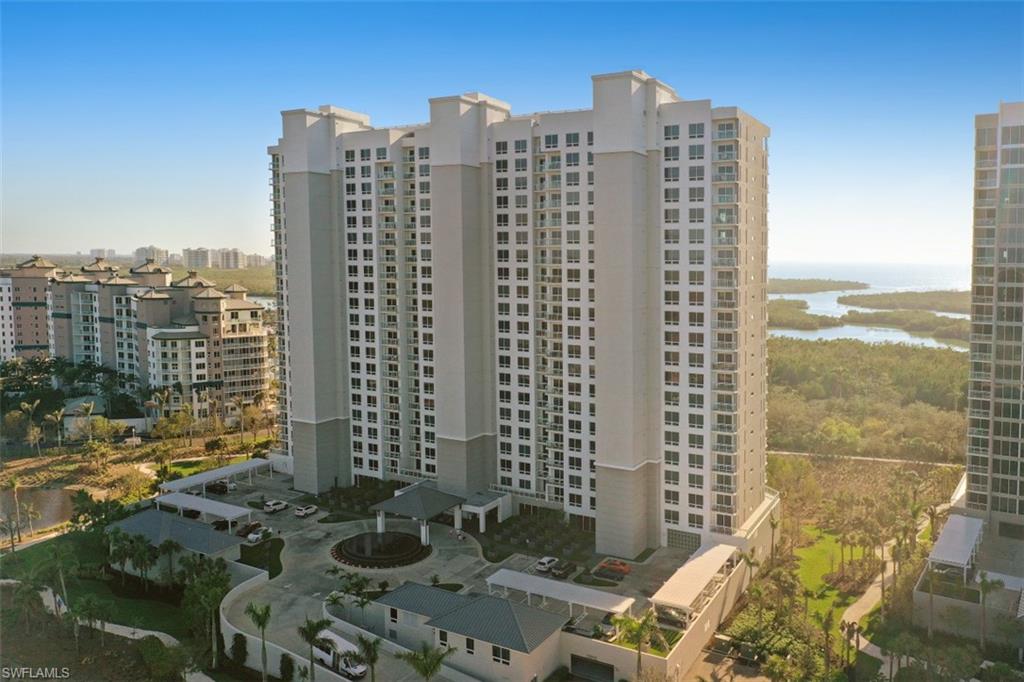 13915 Old Coast Road, Unit 305 Naples, FL 34110 - Photo 37 of 41 a view of a city with tall buildings