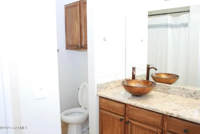 $275,000 | 201 Settlers Trace Boulevard, Unit 2410, Lafayette, LA 70508