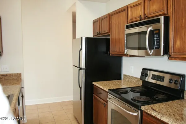 $265,000 | 201 Settlers Trace Boulevard, Unit 2410, Lafayette, LA 70508