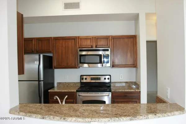 $265,000 | 201 Settlers Trace Boulevard, Unit 2410, Lafayette, LA 70508