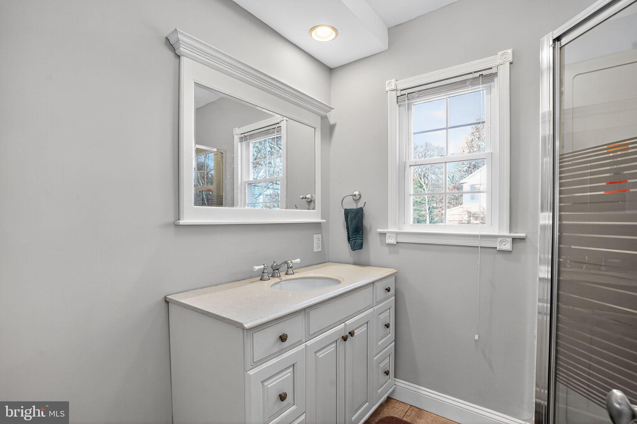 9260 Old Scaggsville Road Laurel, MD 20723 - Photo 11 of 48 a bathroom with a sink vanity and a mirror