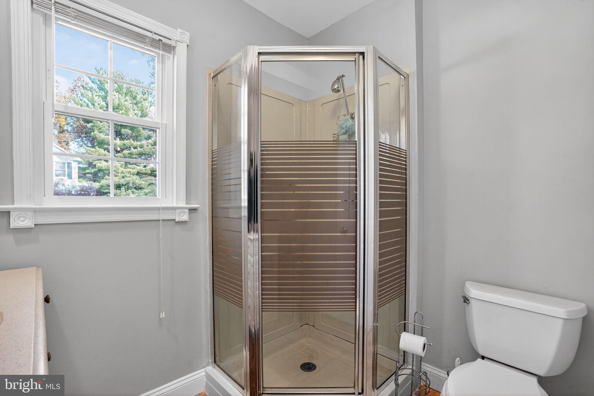 9260 Old Scaggsville Road Laurel, MD 20723 - Photo 12 of 48 a bathroom with a toilet and shower