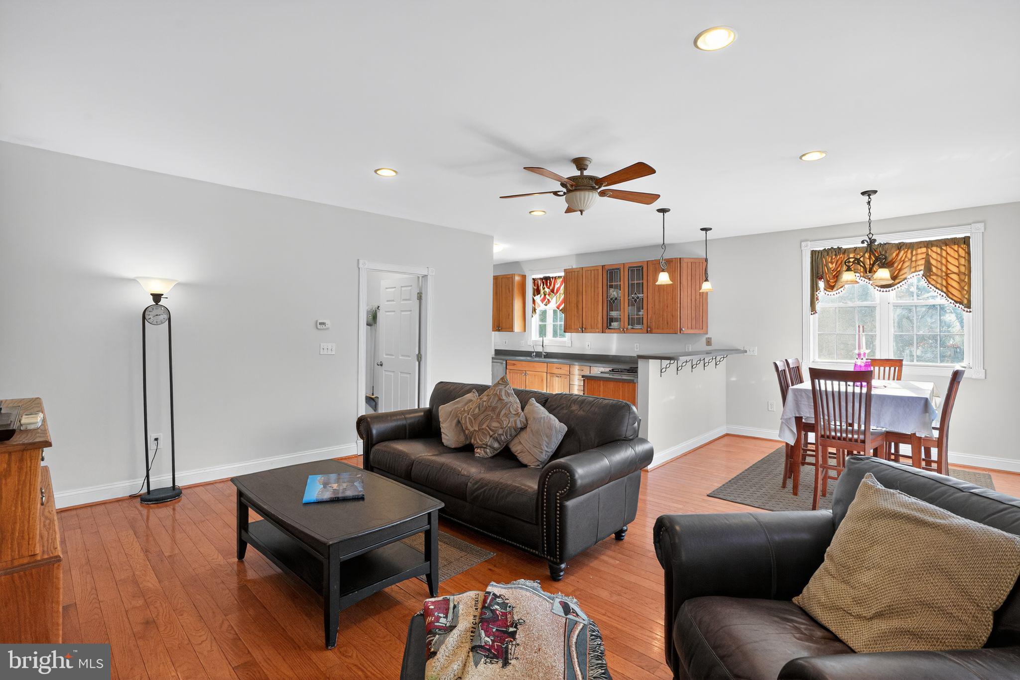 9260 Old Scaggsville Road Laurel, MD 20723 - Photo 17 of 48 a living room with furniture and wooden floor