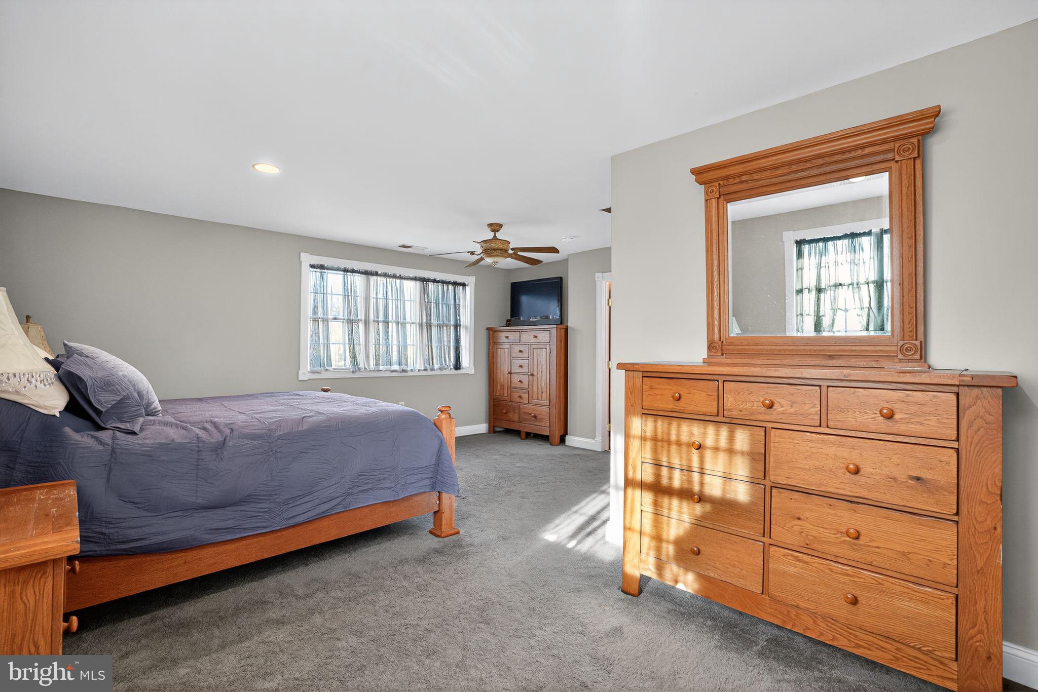 9260 Old Scaggsville Road Laurel, MD 20723 - Photo 21 of 48 a bedroom with a bed and a window