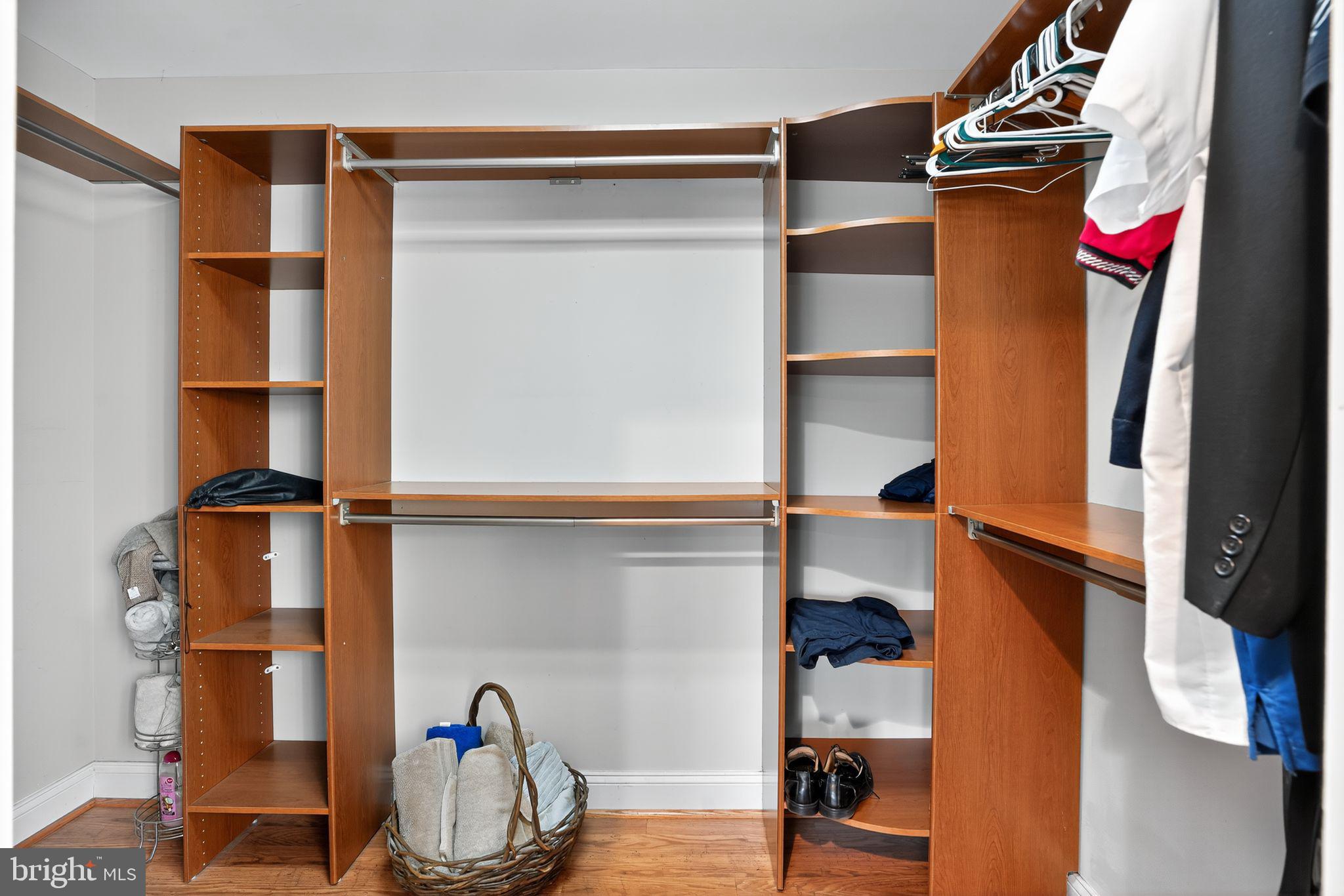 9260 Old Scaggsville Road Laurel, MD 20723 - Photo 22 of 48 a view of walk in closet with clothes and shoes