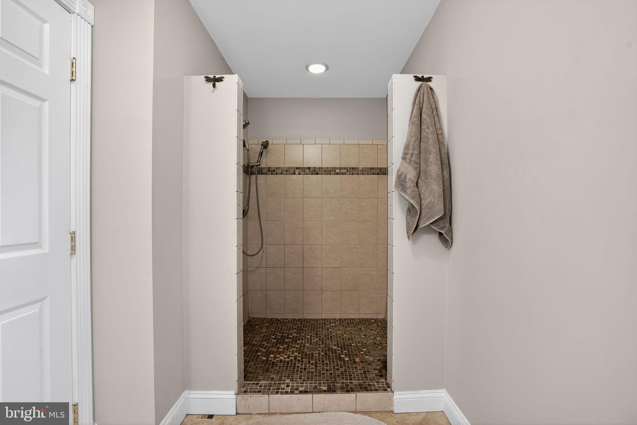 9260 Old Scaggsville Road Laurel, MD 20723 - Photo 25 of 48 a bathroom with a granite countertop shower and a sink