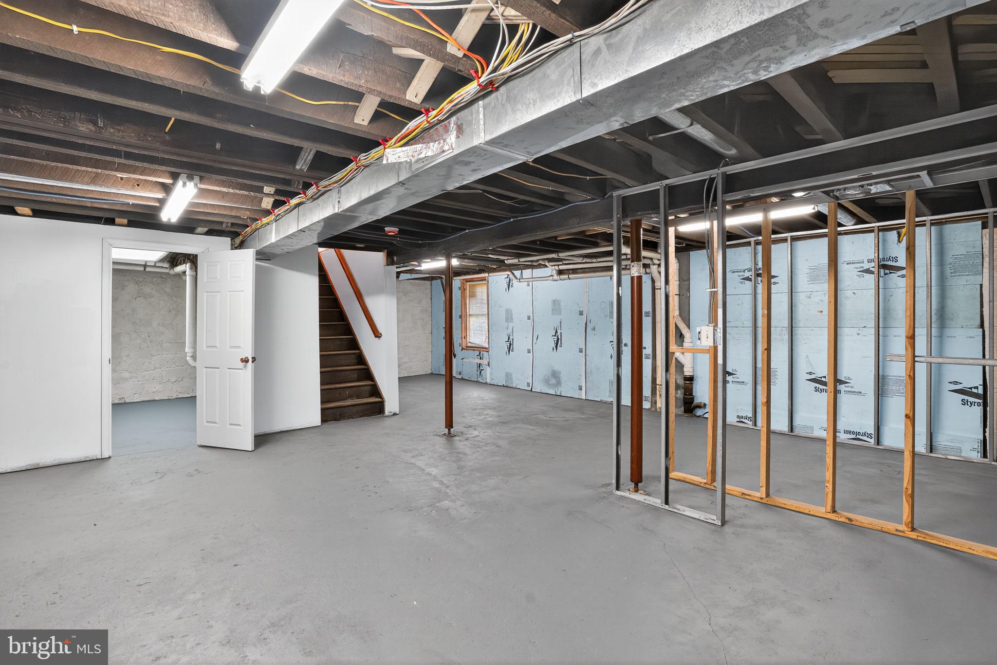 9260 Old Scaggsville Road Laurel, MD 20723 - Photo 34 of 48 a view of an empty room with stairs