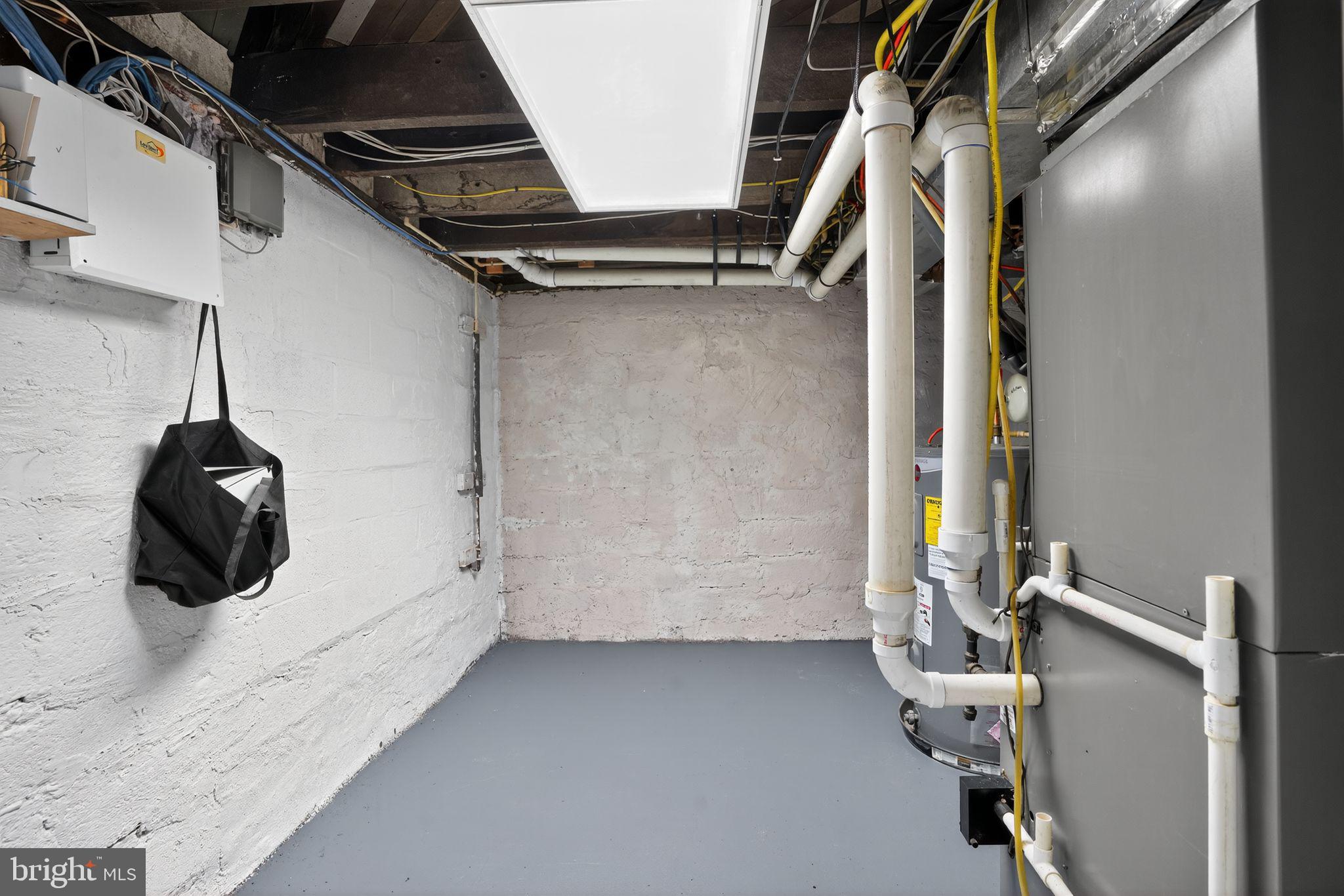 9260 Old Scaggsville Road Laurel, MD 20723 - Photo 37 of 48 a view of walk in closet with clothes and shoes