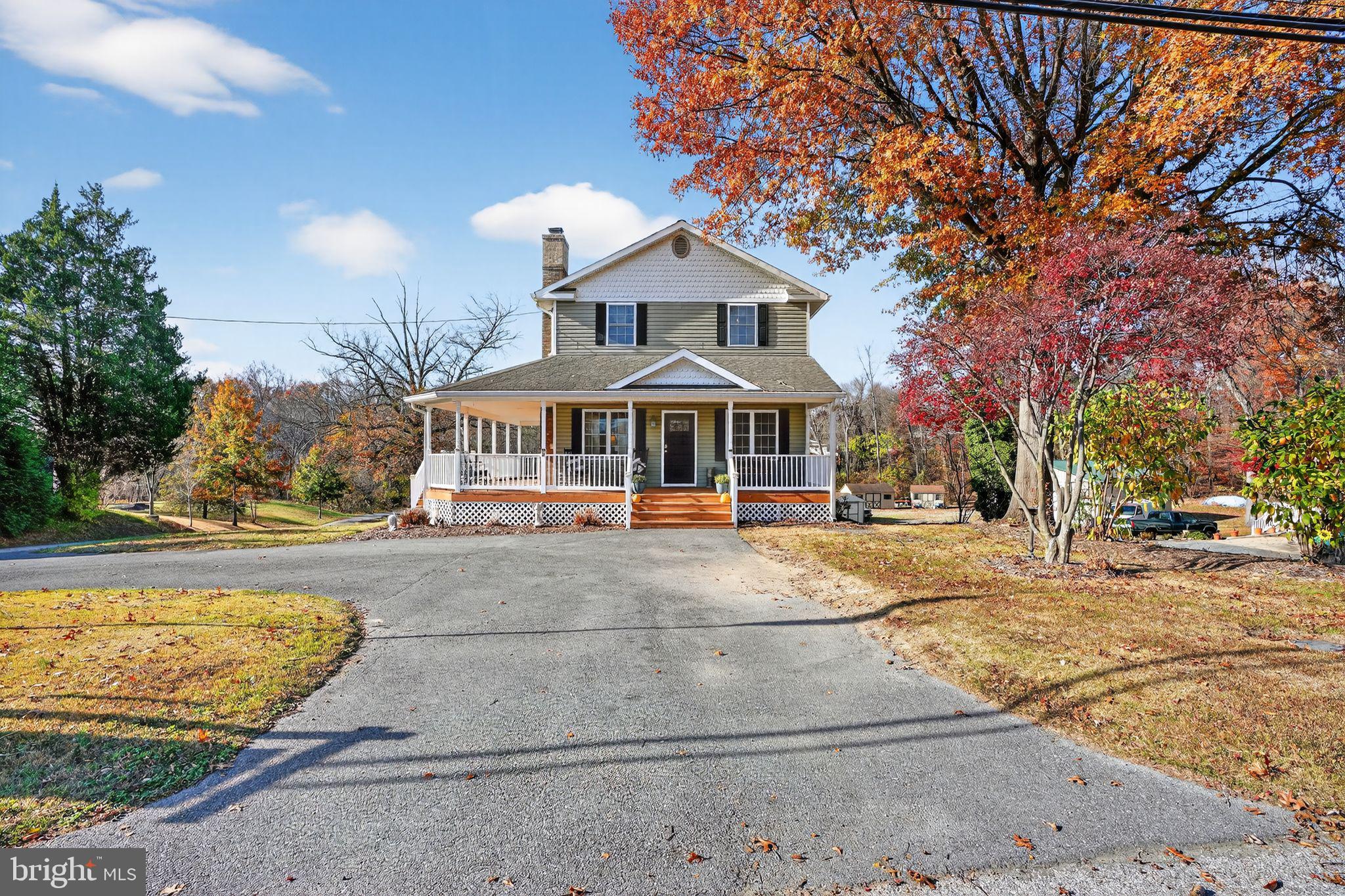 9260 Old Scaggsville Road Laurel, MD 20723 - Photo 40 of 48 a front view of house with yard