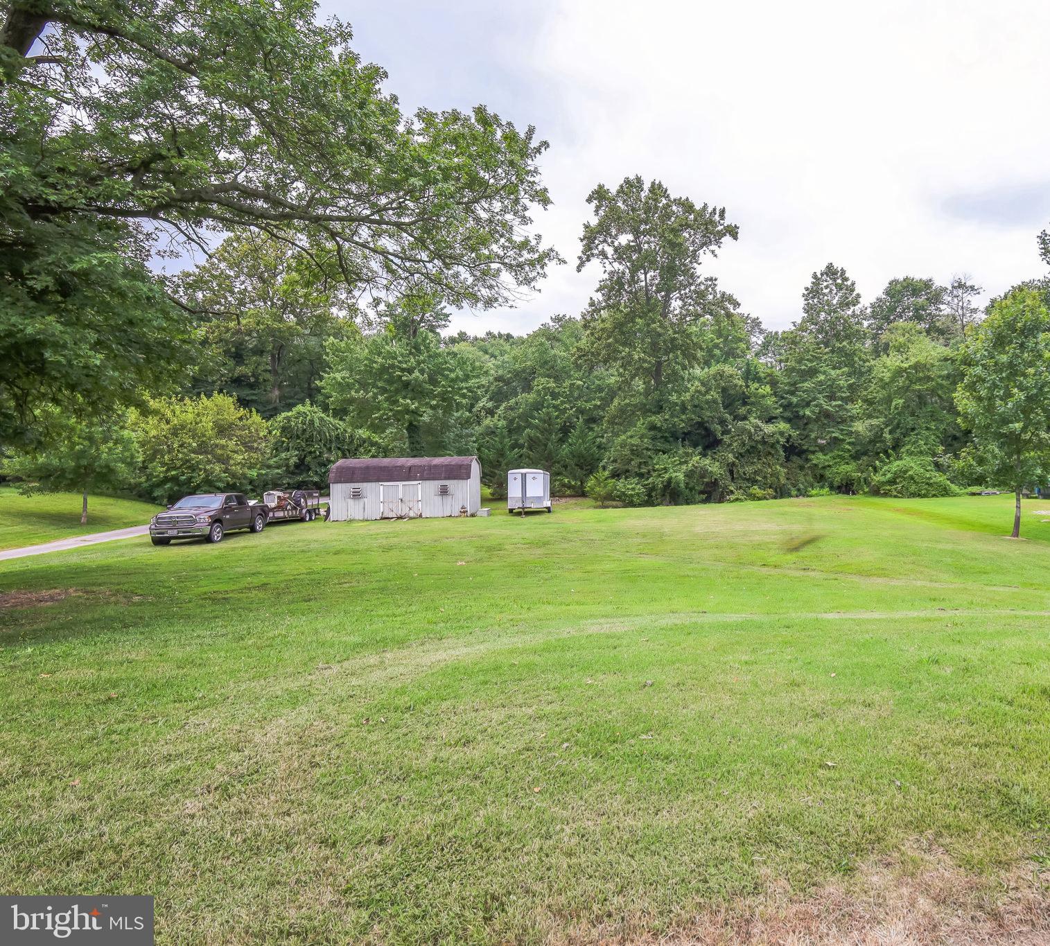 9260 Old Scaggsville Road Laurel, MD 20723 - Photo 45 of 48 a view of a golf course with a garden