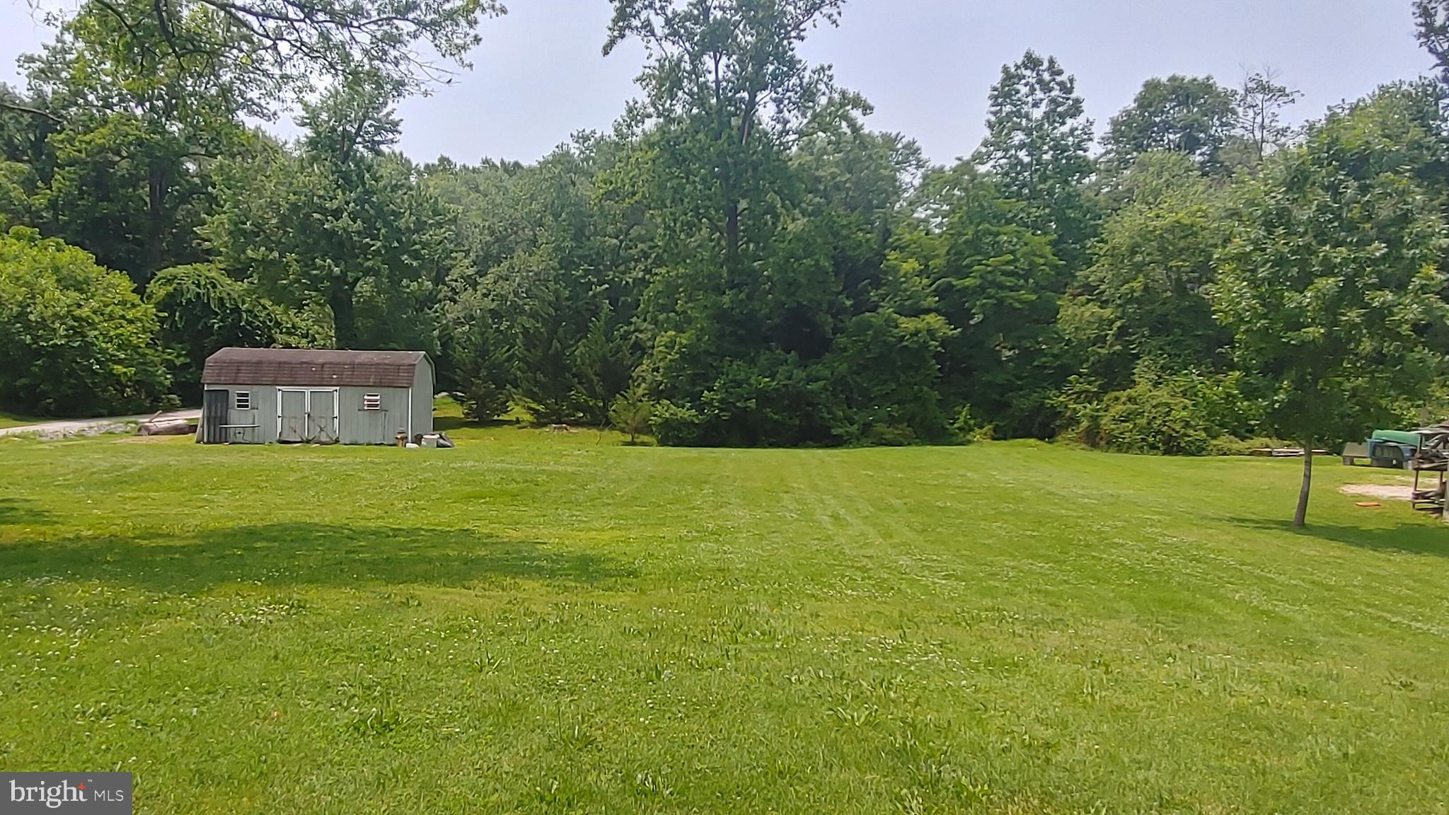 9260 Old Scaggsville Road Laurel, MD 20723 - Photo 48 of 48 a view of a garden with trees