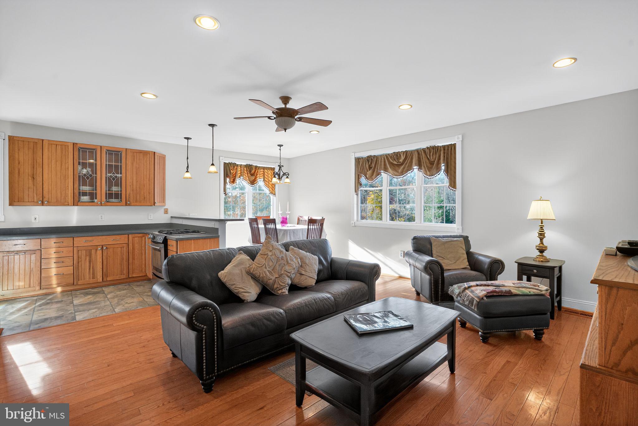 9260 Old Scaggsville Road Laurel, MD 20723 - Photo 5 of 48 a living room with furniture and a wooden floor