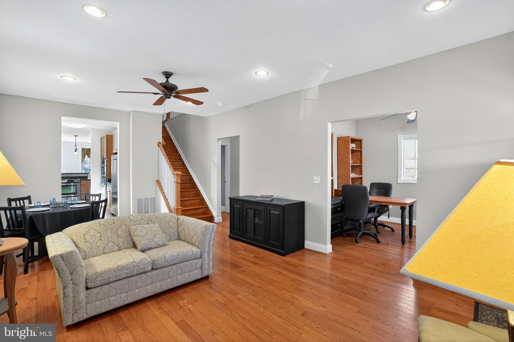 9260 Old Scaggsville Road Laurel, MD 20723 - Photo 6 of 48 a living room with furniture and a wooden floor