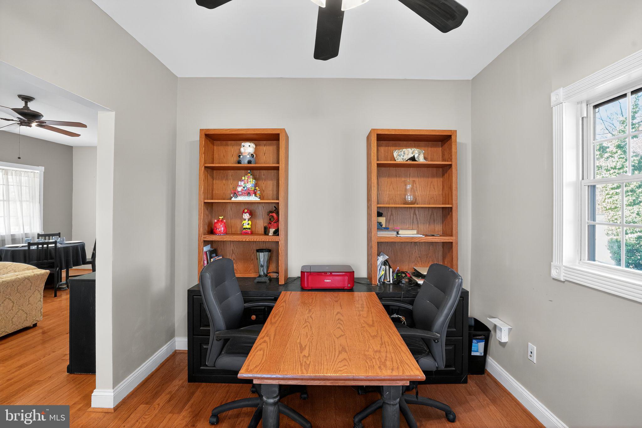 9260 Old Scaggsville Road Laurel, MD 20723 - Photo 7 of 48 a view of a workspace with furniture and window