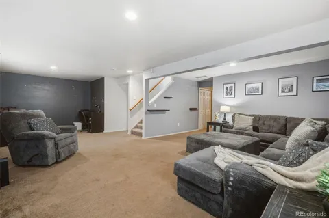 a living room with furniture and a couch