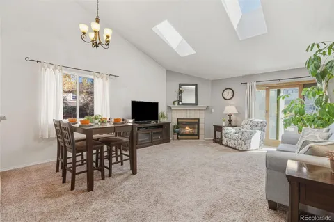 a view of a livingroom with furniture window and outside view