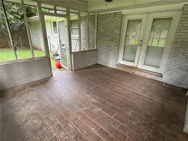 a view of a backyard with a garden